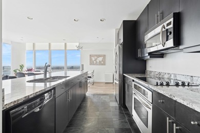ONE OF THE LARGEST UNITS in the building with PANORAMIC VIEWS