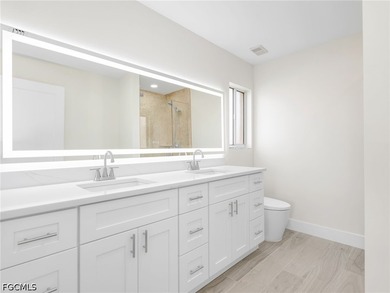 Welcome to this FULLY RENOVATED condo offering tranquil lake - photo 19