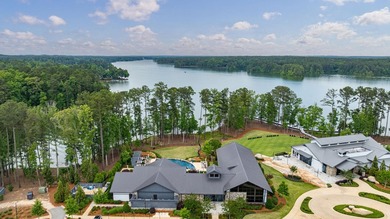 STUNNING LAKE HOME, NEWER CONSTRUCTION, OFFERED FURNISHED AND - photo 5