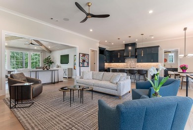 STUNNING LAKE HOME, NEWER CONSTRUCTION, OFFERED FURNISHED AND - photo 9