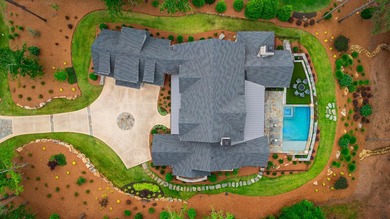 Built in 2023 by acclaimed custom builder Dreambuilt, this 6,008 - photo 2