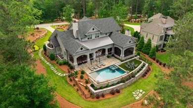 Built in 2023 by acclaimed custom builder Dreambuilt, this 6,008 - photo 3