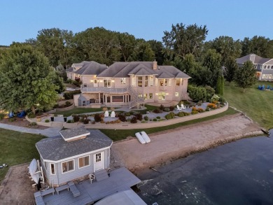 Experience the epitome of luxury lakefront living at this - photo 2