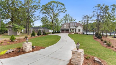 'PENNY'S PLACE' SET ALONG THE SHORELINE OF LAKE OCONEE, IS A - photo 3