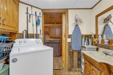 Enjoy lakeside living with this charming and move-in ready cabin - photo 12