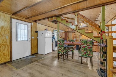 Enjoy lakeside living with this charming and move-in ready cabin - photo 13