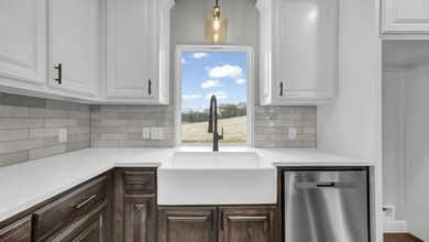 This proposed Ava plan features 3 beds 2 full baths, a - photo 13