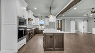 This proposed Ava plan features 3 beds 2 full baths, a - photo 14