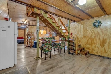 Enjoy lakeside living with this charming and move-in ready cabin - photo 15