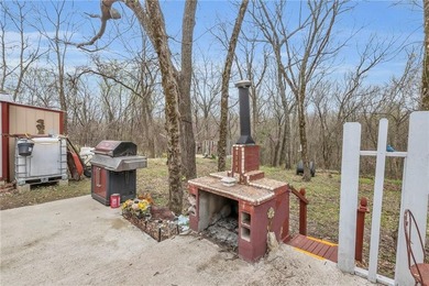 Enjoy lakeside living with this charming and move-in ready cabin - photo 16