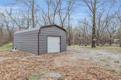 Enjoy lakeside living with this charming and move-in ready cabin - photo 21