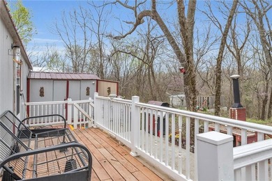Enjoy lakeside living with this charming and move-in ready cabin - photo 23