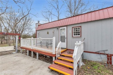 Enjoy lakeside living with this charming and move-in ready cabin - photo 25