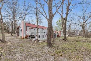 Enjoy lakeside living with this charming and move-in ready cabin - photo 26