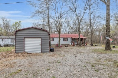 Enjoy lakeside living with this charming and move-in ready cabin - photo 28