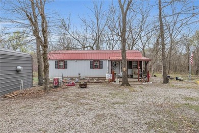 Enjoy lakeside living with this charming and move-in ready cabin - photo 29