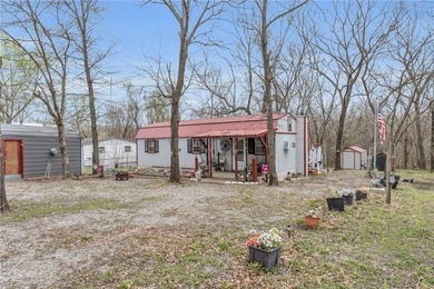 Enjoy lakeside living with this charming and move-in ready cabin - photo 30