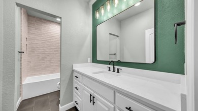 This proposed Ava plan features 3 beds 2 full baths, a - photo 30