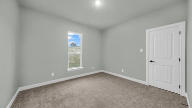 This proposed Ava plan features 3 beds 2 full baths, a - photo 31
