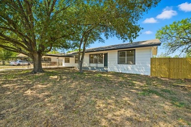Welcome to 7635 Dove Dr! This 3 bedroomm, 2 bath home sits on - photo 2