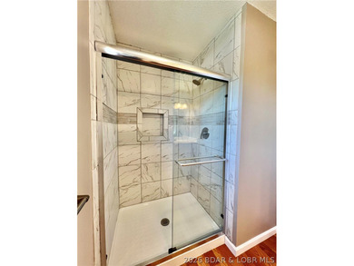 This lovely home is located in a sought-after 55+ community and - photo 21