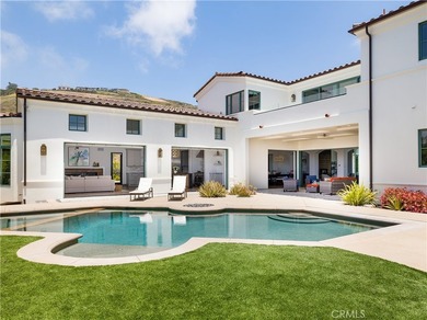 Built in 2019, this Spanish-style residence in The Estates at - photo 2