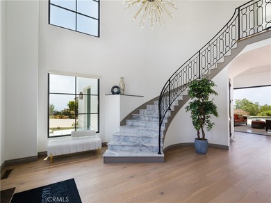 Built in 2019, this Spanish-style residence in The Estates at - photo 3