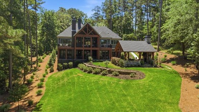 Positioned at the heart of Reynolds Lake Oconee on a prominent 1 - photo 1