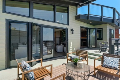 Commandingly perched in coveted Bay Park, this extraordinary - photo 11