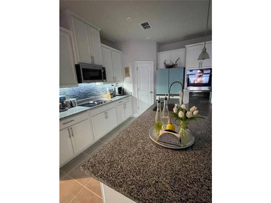 Built in 2023, this beautifully upgraded 5-bedroom, 3-bath home - photo 15
