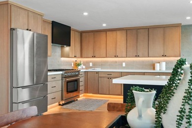 Commandingly perched in coveted Bay Park, this extraordinary - photo 17