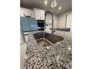 Built in 2023, this beautifully upgraded 5-bedroom, 3-bath home - photo 18