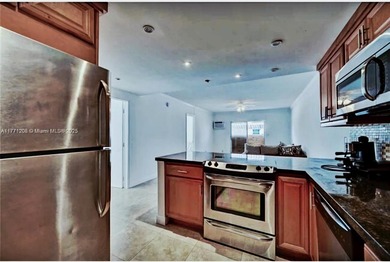 Welcome to this charming 2-bedroom, 1-bathroom condominium - photo 11