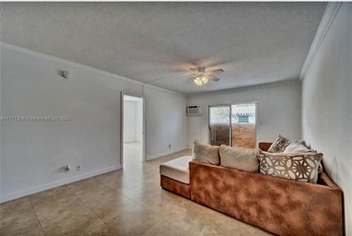 Welcome to this charming 2-bedroom, 1-bathroom condominium - photo 12