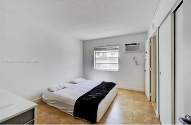 Welcome to this charming 2-bedroom, 1-bathroom condominium - photo 13