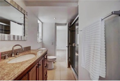 Welcome to this charming 2-bedroom, 1-bathroom condominium - photo 18