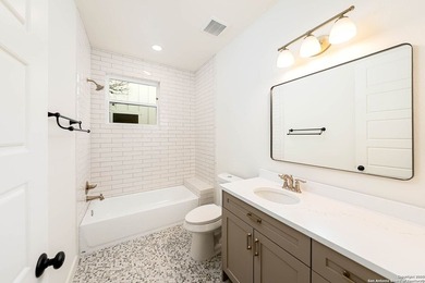 This brand-new modern farmhouse showcases thoughtful design and - photo 31