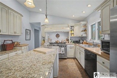 4 bedroom, 4 bath home set on a quiet street with an impressive - photo 10