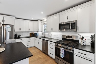 Welcome to 42 True Street, a beautifully designed 3-bedroom, 2 - photo 5
