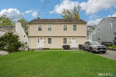 Well-maintained and thoughtfully updated 2-family in Stamford's - photo 1