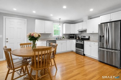 Well-maintained and thoughtfully updated 2-family in Stamford's - photo 7