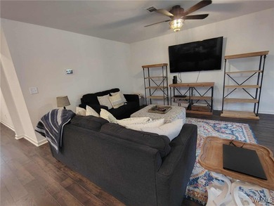 Charming 3-bedroom, 2 bath , 2 car garage home is nestled in