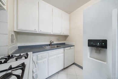 Welcome to this inviting residence at 85-15 Main Street, ideally - photo 3