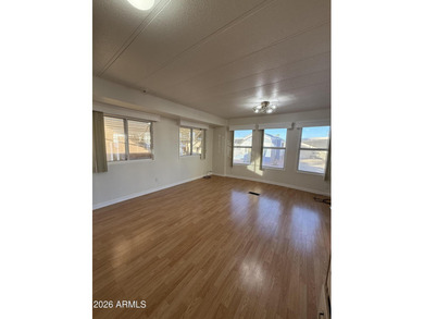 Welcome to a beautiful adult community in Sun City with a prime