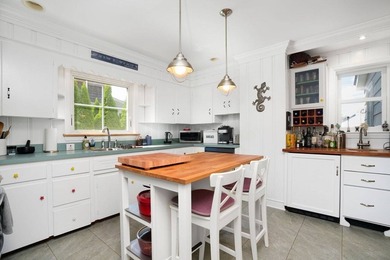This Charming Victorian home captures the timeless elegance of - photo 3