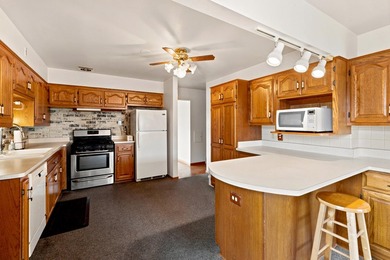 Welcome home to this well-maintained split 4-bedroom - photo 10
