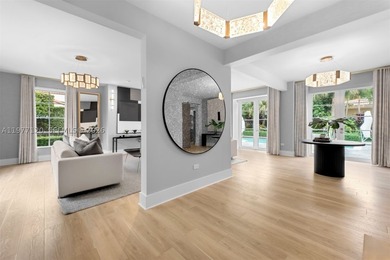 This luxurious Miami Beach estate presents a seamless blend of - photo 11