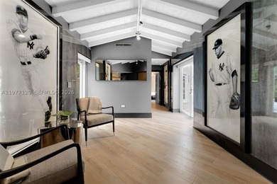 This luxurious Miami Beach estate presents a seamless blend of - photo 12