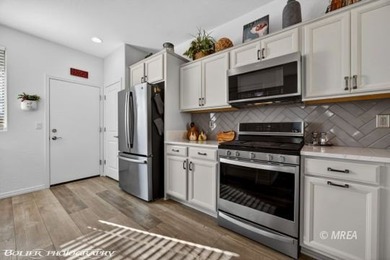 Welcome to this beautifully upgraded single-story home offering