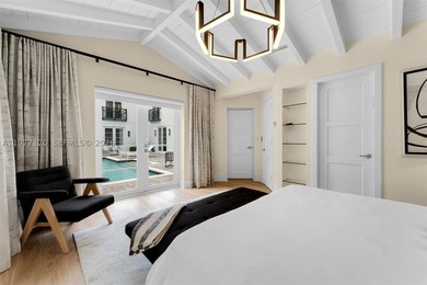 This luxurious Miami Beach estate presents a seamless blend of - photo 14